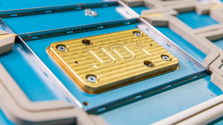 Embossing die with You lettering in paperboard cutting-die | © Marbach Group