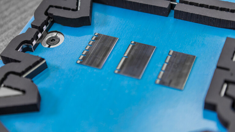 Marbach Stanzformtechnik Wellpappe Haltepunktwechselsystem Anpassung Schneidlinien