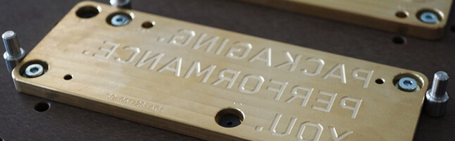 Embossing register system for embossing dies. 