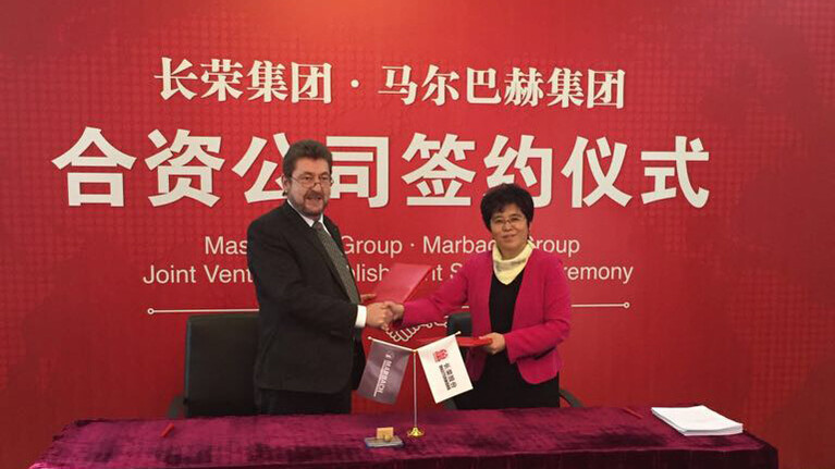 Joint Venture Marbach Masterwork China. Shakehands Peter Marbach Li Li