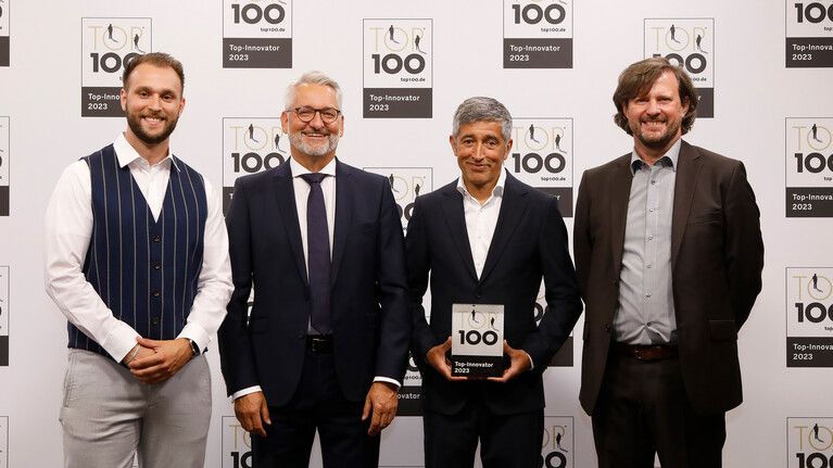 Marbach Top 100 award ceremony. Receiving the Top 100 trophy. | © Marbach Group